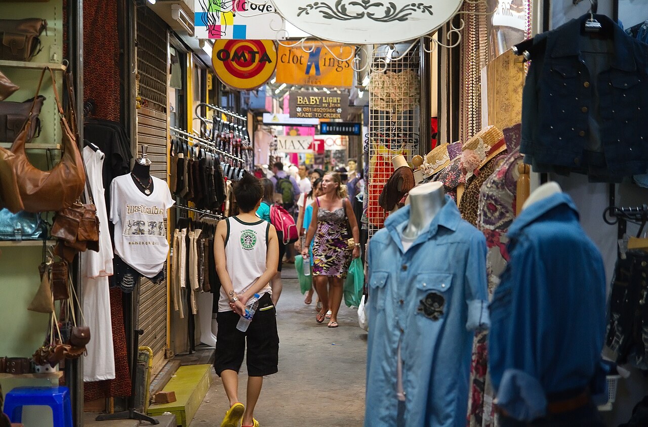 A narrow lane of clothing shops at Chatuchak Weekend Market
