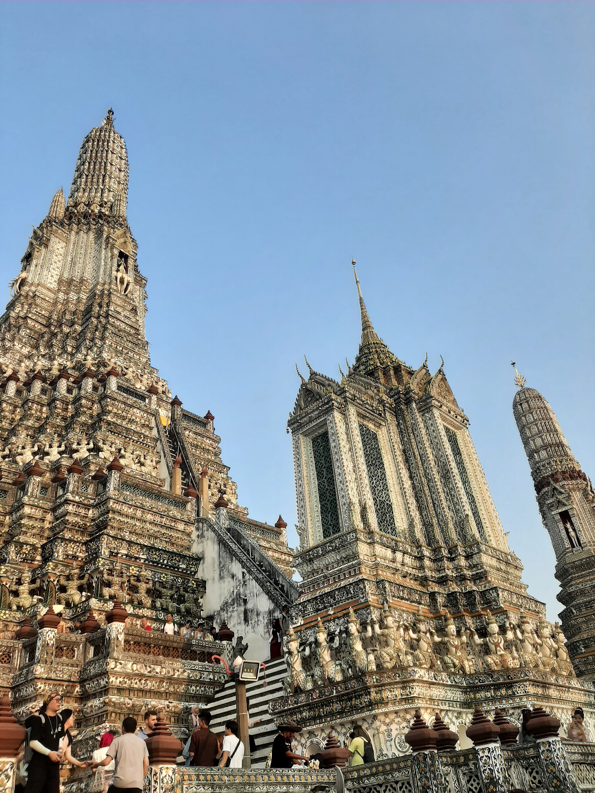The central prang and smaller towers at Wat Arun, covered in ceramic decoration