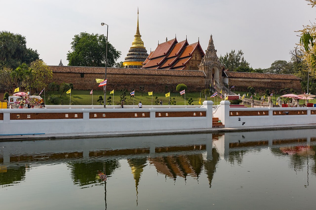 The Lampang Luang chedi and halls viewed from outside the wall